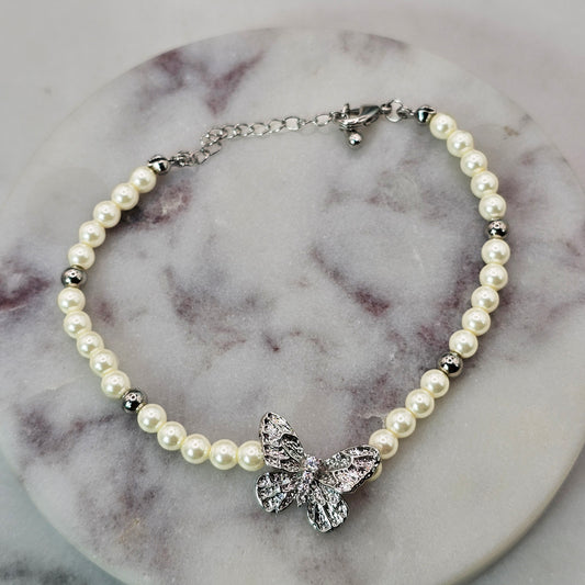 Pulsera Baño de Plata Rodinada Cristal Austriaco Mariposa y Perlas