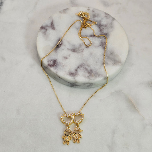 Collar Baño de Oro Sutil Doble Corazon Niños